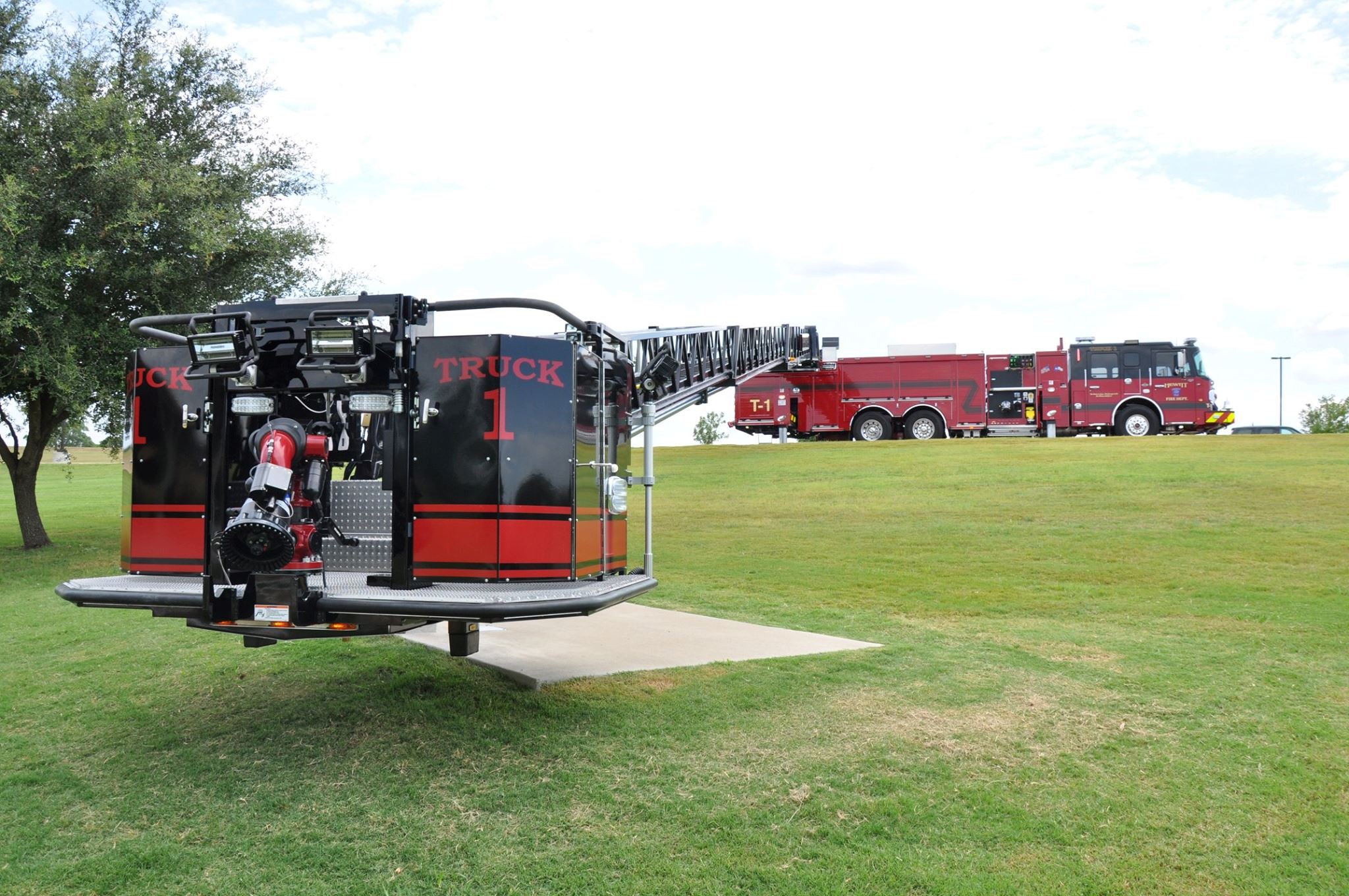 Image of Truck 1, displaying the below grade capabilities of the mounted ladder.